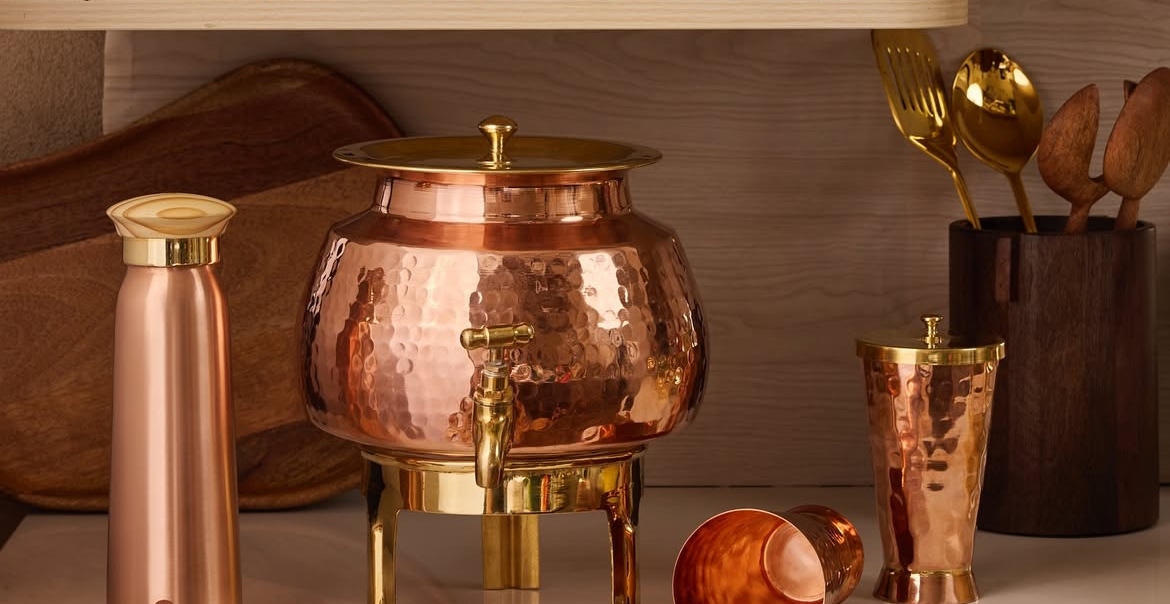 Family morning ritual with copper vessel